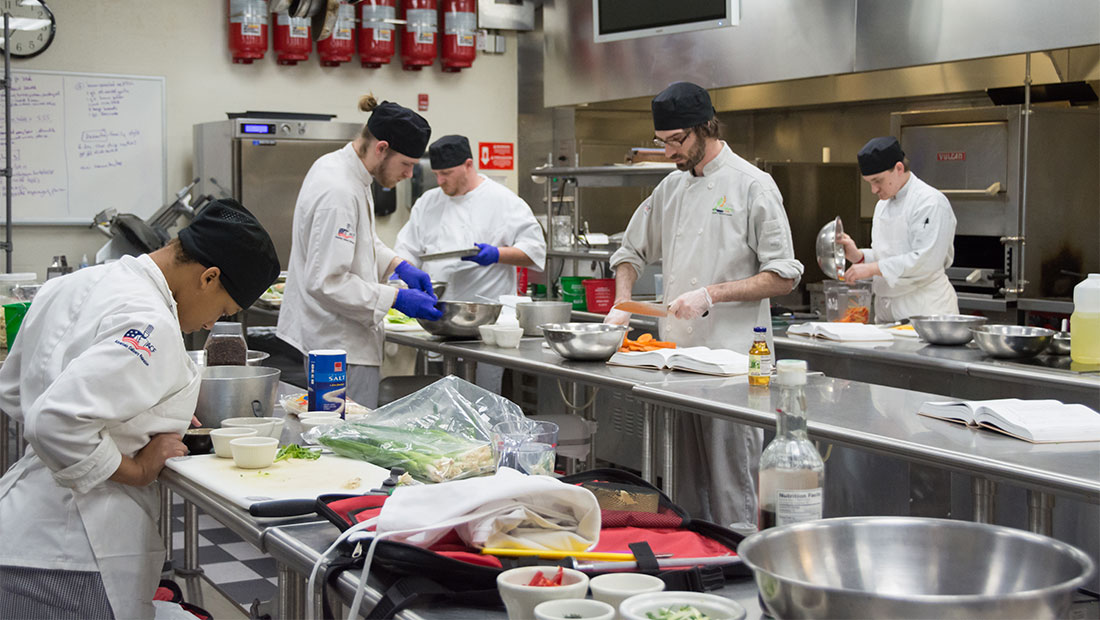 Students cooking in a kitchen