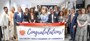 Group of people at a ribbon cutting