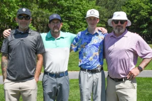 four golfers