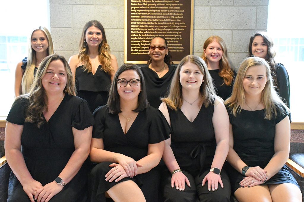 Occupational therapy assistant students participate in pinning and