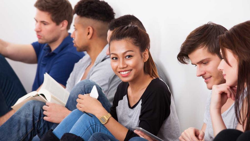 First-generation college students bonding and studying together in TRIO support program.