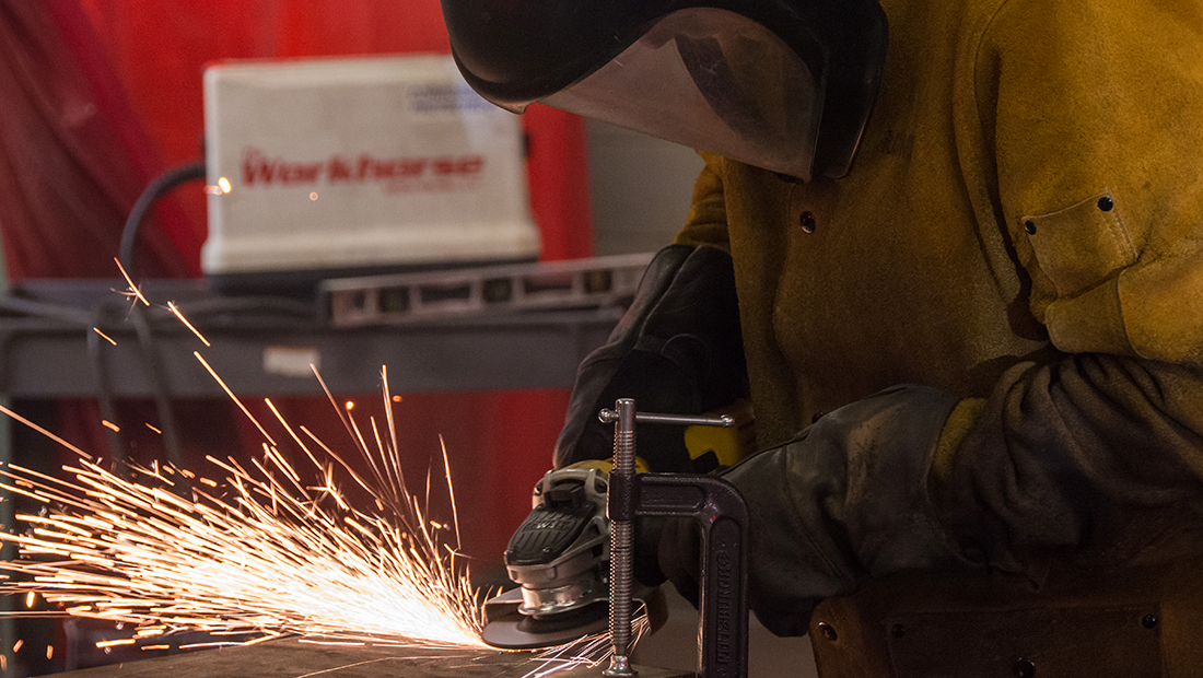 Welder using a grinder